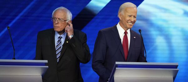 Senator Bernie Sanders and former Vice President Joe Biden stand back to back during a break at the 2020 Democratic U.S. presidential debate in Houston, Texas, U.S. September 12, 2019. REUTERS/Mike Blake Senator Bernie Sanders and former Vice President Joe Biden stand back to back during a break at the 2020 Democratic U.S. presidential debate in Houston, Texas, U.S. September 12, 2019. REUTERS/Mike Blake - Sputnik International