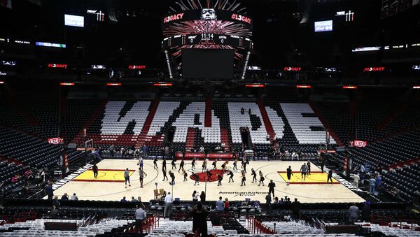 A general view shirts on the seats honoring Miami Heat's Dwyane Wade (3) prior to his final regular season home game of his career at American Airlines Arena prior to the game between the Philadelphia 76ers before an NBA basketball game Tuesday, April 9, 2019, in Miami. (AP Photo/Brynn Anderson) - Sputnik International