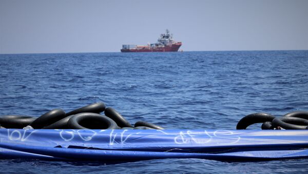 The migrant rescue ship Ocean Viking, run by French charities Medecins Sans Frontieres and SOS Mediterranee, floats in the distance, as it waits in international waters between Malta and the southern Italian island of Linosa for access to a port in this handout picture taken between August 9 and 12, 2019. Hannah Wallace Bowman/MSF/Handout via REUTERS   ATTENTION EDITORS - THIS IMAGE HAS BEEN SUPPLIED BY A THIRD PARTY. MANDATORY CREDIT. - Sputnik International