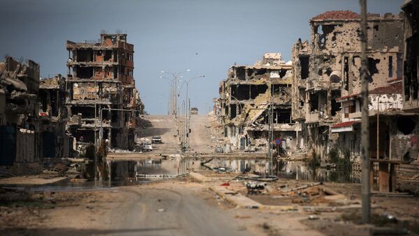This Oct. 22, 2011 file photo, shows a general view of buildings ravaged by fighting in Sirte, Libya. - Sputnik International