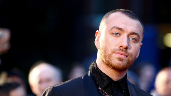 FILE PHOTO: Singer Sam Smith poses as they arrive to the GQ Men Of The Year Awards 2019 in London, 3 September 2019. REUTERS/Henry Nicholls - Sputnik International