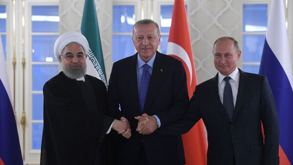 L-R: Iranian President Hassan Rouhani, Turkish President Recep Tayyip Erdogan and Russian President Vladimir Putin - Sputnik International