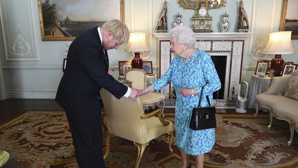 Britain's Queen Elizabeth II welcomes newly elected leader of the Conservative party Boris Johnson during an audience at Buckingham Palace, London, Wednesday July 24, 2019, where she invited him to become Prime Minister and form a new government - Sputnik International