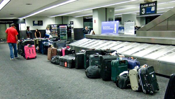 Please report any unattended luggage - Sputnik International