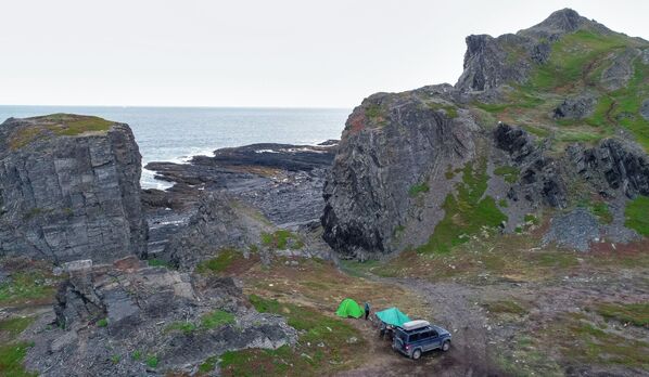 A tourist camp at Cape Kekursky on the Rybachy Peninsula in Murmansk region - Sputnik International