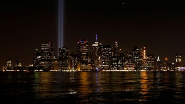 The Tribute in Light installation illuminates lower Manhattan, as seen from the borough of Brooklyn, marking the 18th anniversary of the 9/11 attacks in New York City, U.S., September 11, 2019 - Sputnik International