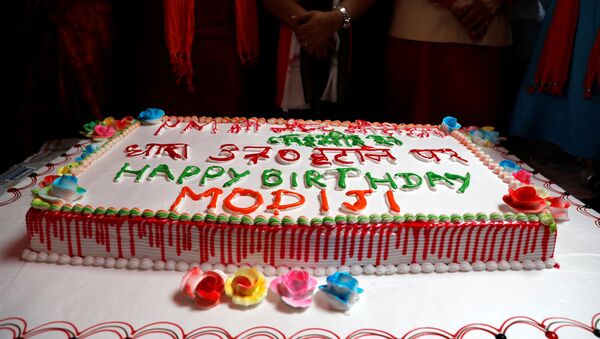 A cake is seen during an event to mark Indian Prime Minister Narendra Modi's birthday at a school, in New Delhi, India, September 17, 2019 - Sputnik International