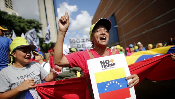 Supporters of President Nicolas Maduro chants slogans during a rally to celebrate the 11 years of the Socialist Party of Venezuela' youth, in Caracas, Venezuela, Thursday, Sept 12, 2019. - Sputnik International