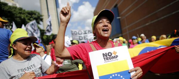 Supporters of President Nicolas Maduro chants slogans during a rally to celebrate the 11 years of the Socialist Party of Venezuela' youth, in Caracas, Venezuela, Thursday, Sept 12, 2019. - Sputnik International