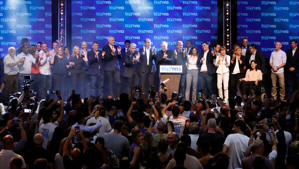 Blue and White party leader Benny Gantz and party co-leaders Yair Lapid, Moshe Yaalon and Gaby Ashkenazi react at the party's headquarters following the announcement of exit polls during Israel's parliamentary election in Tel Aviv, Israel September 18, 2019 - Sputnik International