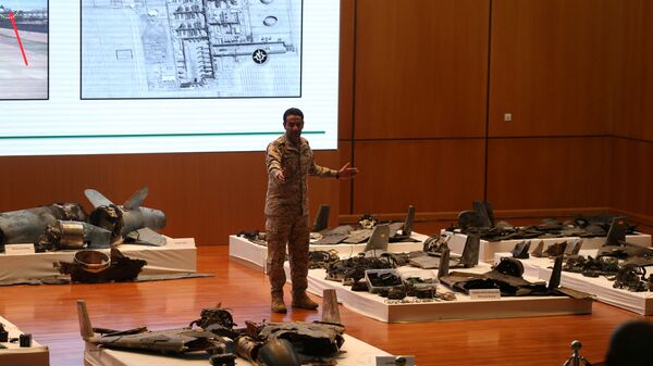 Saudi defence ministry spokesman Colonel Turki Al-Malik displays remains of the missiles which Saudi government says were used to attack an Aramco oil facility, during a news conference in Riyadh, Saudi Arabia September 18, 2019 - Sputnik International