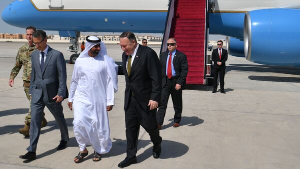 US Secretary of State Mike Pompeo walks alongside an unidentified UAE official upon his arrival at al-Bateen Air Base in Abu Dhabi, United Arab Emirates September 19, 2019. - Sputnik International