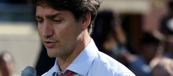Canada's Prime Minister Justin Trudeau speaks during an election campaign stop in Winnipeg, Manitoba, Canada September 19, 2019 - Sputnik International