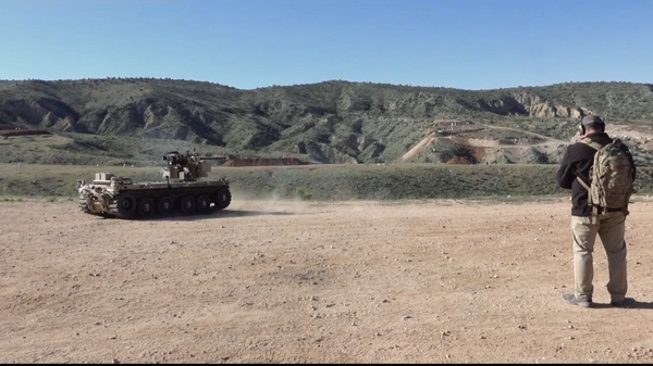 During a recent test, the team of Pratt & Miller, Northrop Grumman and EOS, showed the capability of the Pratt & Miller expeditionary modular autonomous vehicle, or EMAV to fire the M230 Link Fed (M230LF) integrated on the vehicle with the EOS R400 Remote Weapons station. - Sputnik International