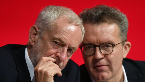 Britain's opposition Labour Party leader Jeremy Corbyn, left, talks with deputy leader Tom Watson during the start of the party's annual conference in Liverpool, England - Sputnik International