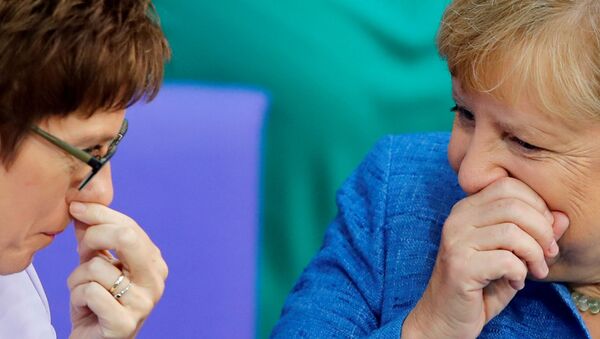 German Chancellor Angela Merkel talks with German Defence Minister Annegret Kramp-Karrenbauer during the budget debate in the Bundestag, the lower house of parliament in Berlin, Germany September 11, 2019. - Sputnik International