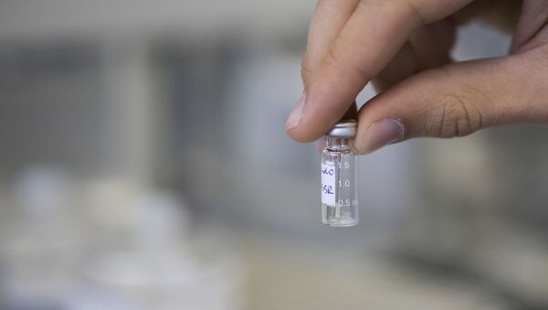 In this May 8, 2015 file photo, a lab technician shows a sample to be tested for doping at the Brazilian Doping Control Laboratory, the lab that did drug testing for the 2016 Olympic and Paralympic Games, in Rio de Janeiro, Brazil. - Sputnik International