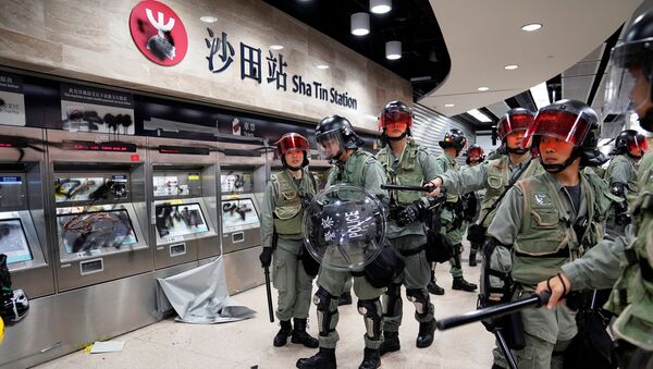 Police officers walk at Sha Tin Station in Hong Kong, China September 22, 2019. - Sputnik International