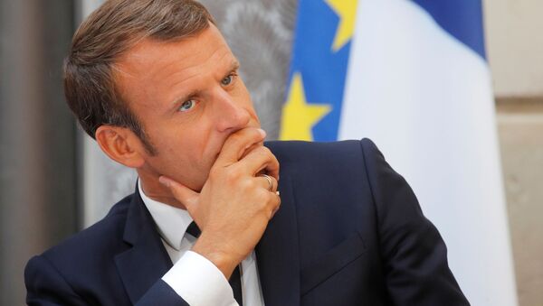 French President Emmanuel Macron reacts as he inaugurates the Commission on the first 1000 days of the child in Paris, France September 19, 2019 - Sputnik International