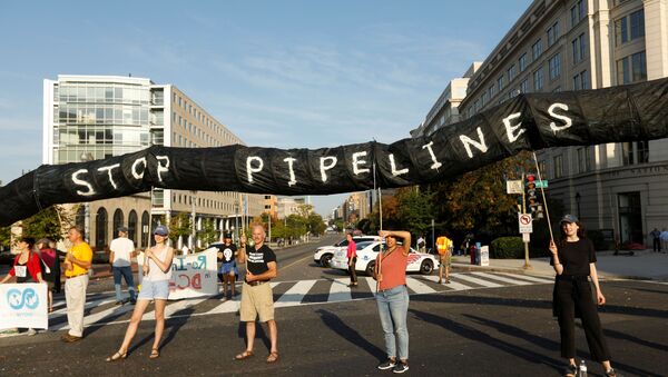 Environmental activists block traffic as part of climate change protest in Washington - Sputnik International