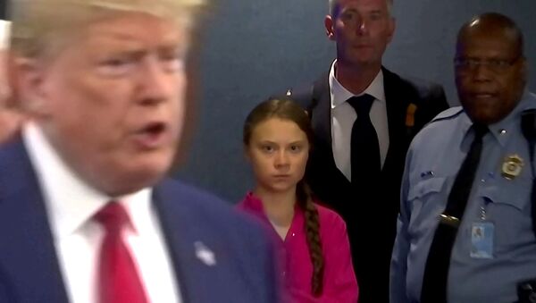 Swedish environmental activist Greta Thunberg watches as US President Donald Trump enters the United Nations to speak with reporters in a still image from a video taken in New York City, 23 September 2019 - Sputnik International