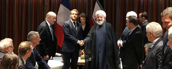 French President Emmanuel Macron shakes hands with Iranian President Hassan Rouhani during their meeting on the sidelines of the United Nations General Assembly in New York, U.S., September 23, 2019 French President Emmanuel Macron shakes hands with Iranian President Hassan Rouhani during their meeting on the sidelines of the United Nations General Assembly in New York, U.S., September 23, 2019 - Sputnik International