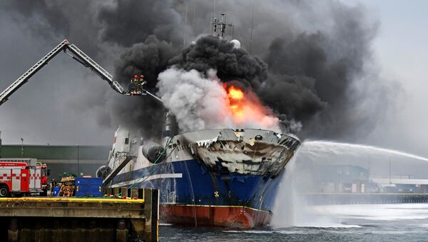 The Russian fishing trawler Bukhta Naezdnik burns in the harbour of Tromso, Norway September 25, 2019. Picture taken September 2019 - Sputnik International