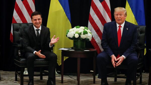 U.S. President Donald Trump listens during a bilateral meeting with with Ukraine's President Volodymyr Zelensky on the sidelines of the 74th session of the United Nations General Assembly (UNGA) in New York City, New York, U.S., September 25, 2019 - Sputnik International
