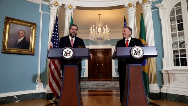 U.S. Secretary of State Mike Pompeo (R) and Brazilian Foreign Minister Ernesto Araujo hold a joint news conference after their meeting at the State Department in Washington, U.S., September 13, 2019 - Sputnik International