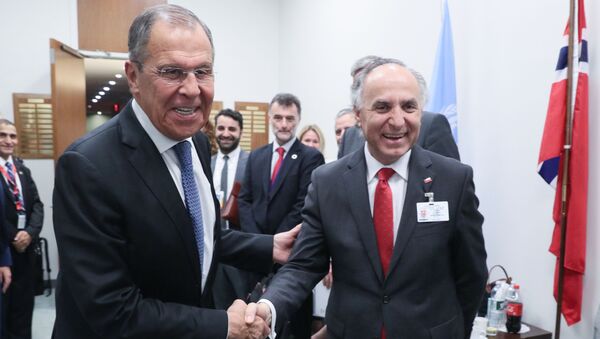 Russian Foreign Minister Sergey Lavrov and Chile's Foreign Minister Teodoro Ribera shake hands prior to a meeting on the sidelines of the 74th session of the UN General Assembly at the headquarters of the United Nations in Manhattan, New York, United States - Sputnik International