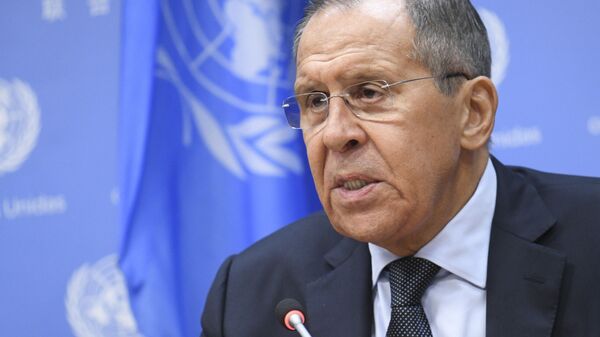 Russia's Foreign Minister Sergei Lavrov, right, gives a news conference at the 74th session of the United Nations General Assembly at the UN headquarters of the United Nations in Manhattan, New York, United States. - Sputnik International
