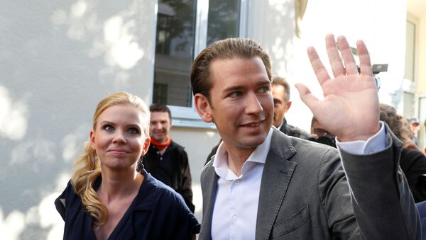Top candidate of Peoples Party (OeVP) and former Chancellor Sebastian Kurz leaves with his girlfriend Susanne Thier after casting his ballot at a polling station in Vienna, Austria September 29, 2019. - Sputnik International