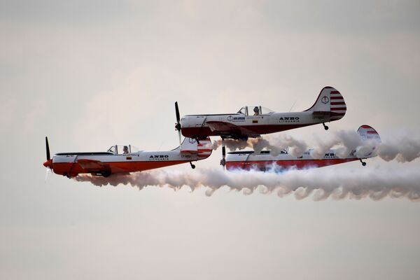 Yakovlev Yak-50 aircraft of the ANBO aerobatic team from Lithuania perform during a demonstration flight at the MAKS-2019 International Aviation and Space Show in Zhukovsky, outside Moscow, Russia. - Sputnik International