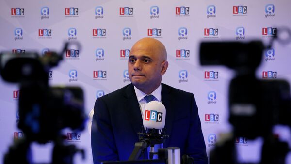 Britain's Chancellor of the Exchequer Sajid Javid participates in a radio interview during the Conservative Party annual conference in Manchester, Britain, September 30, 2019 - Sputnik International