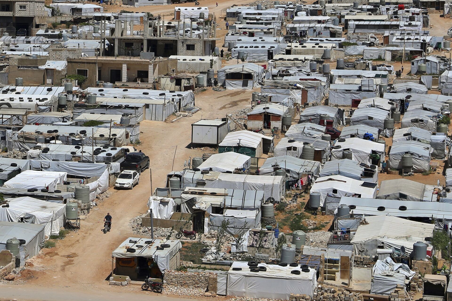  This June 16, 2019, file photo, shows a Syrian refugee camp in the eastern Lebanese border town of Arsal - Sputnik International, 1920, 21.09.2022