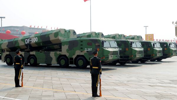 Military vehicles carrying hypersonic cruise missiles DF-100 drive past Tiananmen Square during the military parade marking the 70th founding anniversary of People's Republic of China, on its National Day in Beijing, China October 1, 2019 - Sputnik International
