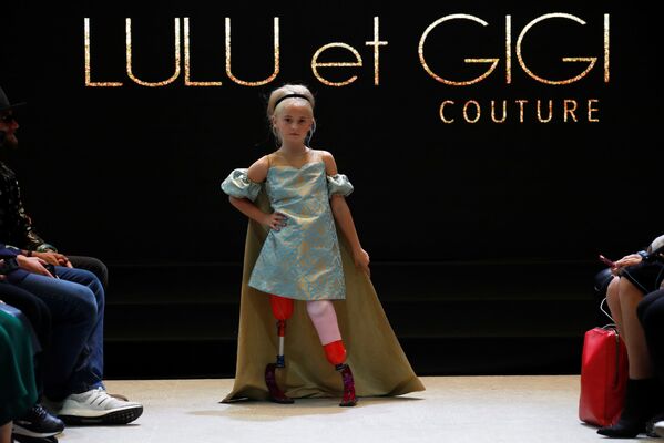 Model Daisy-May Demetre presents a creation by Designer Eni Hegedus-Buiron for luxury children's wear label Lulu et Gigi during Paris Fashion Week in Paris, France, September 27, 2019.  - Sputnik International