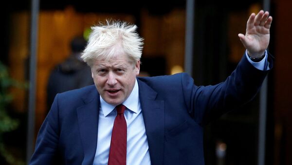 Britain's Prime Minister Boris Johnson is seen outside the venue for the Conservative Party annual conference in Manchester, Britain October 1, 2019 - Sputnik International