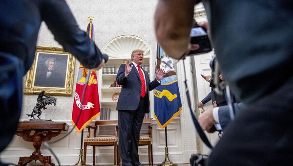 President Donald Trump speaks to member of the media as he departs a ceremonial swearing in ceremony for new Labor Secretary Eugene Scalia in the Oval Office of the White House in Washington, Monday, Sept. 30, 2019 - Sputnik International
