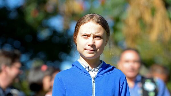 Climate change teen activist Greta Thunberg looks on before joining a climate strike march in Montreal, Quebec, Canada September 27, 2019 - Sputnik International