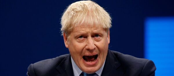 Britain's Prime Minister Boris Johnson gives a closing speech at the Conservative Party annual conference in Manchester, Britain, October 2, 2019. Britain's Prime Minister Boris Johnson gives a closing speech at the Conservative Party annual conference in Manchester, Britain, October 2, 2019. - Sputnik International