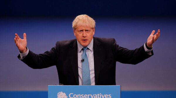 Britain's Prime Minister Boris Johnson gestures as he gives a closing speech at the Conservative Party annual conference in Manchester, Britain, October 2, 2019 - Sputnik International