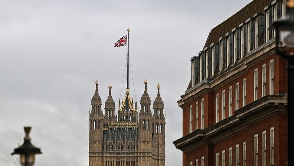 A Union flag is pictured flying in Westminster, and at the Houses of Parliament in central London on January 16, 2019. - Sputnik International