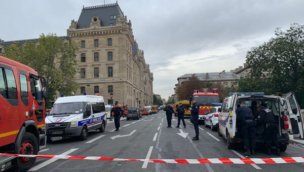 French police secure the area in front of the Paris Police headquarters in Paris, France, October 3, 2019 - Sputnik International