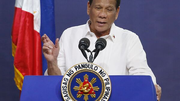 FILE - In this Aug. 27, 2019, file photo, Philippine President Rodrigo Duterte gestures as he addresses the topic of land reform in Manila, Philippines - Sputnik International