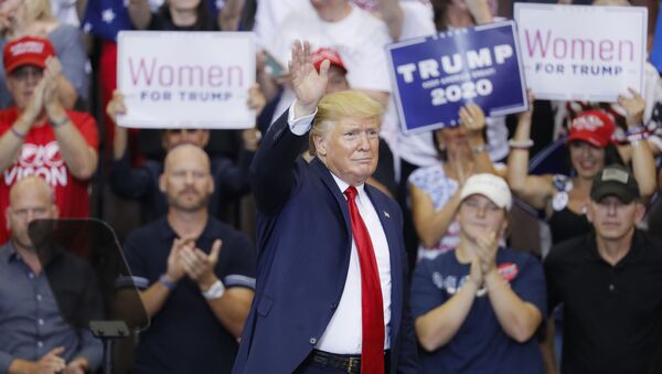 President Donald Trump waves to the crowd before exiting a campaign rally at U.S. Bank Arena, Thursday, Aug. 1, 2019, in Cincinnati. - Sputnik International