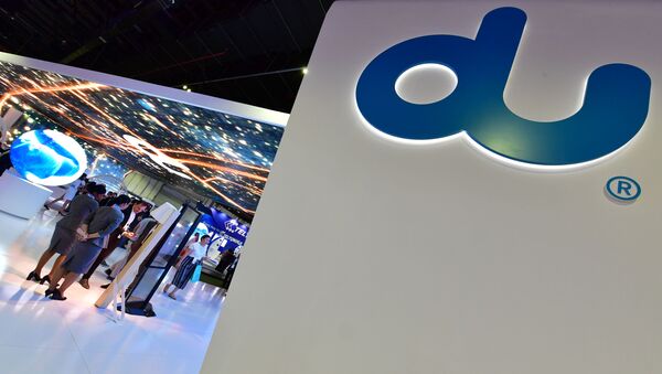 A DU logo, an emiratee phone network, is seen at the Gitex 2017 exhibition at the Dubai World Trade Center in Dubai on October 8, 2017. - Sputnik International