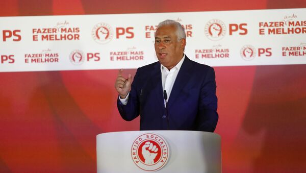 Portuguese Prime Minister and Socialist Party leader Antonio Costa addresses supporters following the announcement of election results in Lisbon Sunday night, Oct. 6, 2019. - Sputnik International