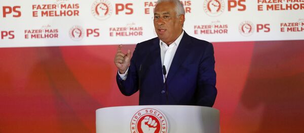 Portuguese Prime Minister and Socialist Party leader Antonio Costa addresses supporters following the announcement of election results in Lisbon Sunday night, Oct. 6, 2019. - Sputnik International