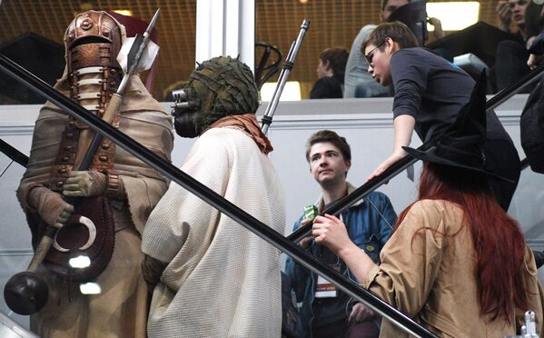 Visitors and cosplayers at the IgroMir 2019 exhibition and the Comic Con Russia 2019 at the Crocus Expo international exhibition centre in Moscow. - Sputnik International